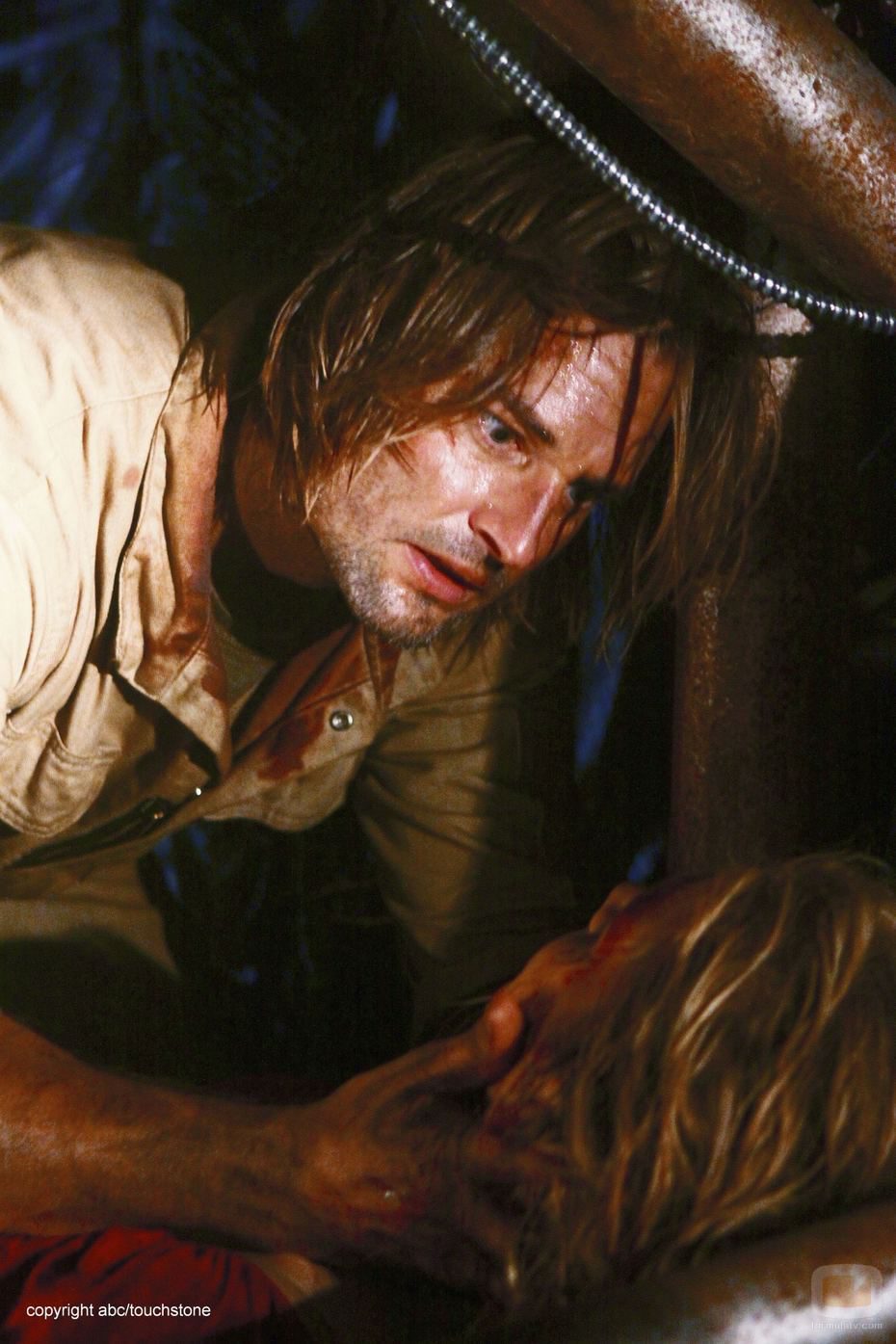 Sawyer encuentra a Juliet moribunda