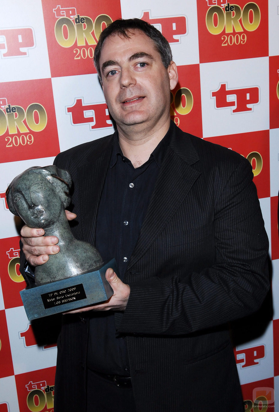 Javier Iriarte con el TP de Oro de 'Los Simpson'