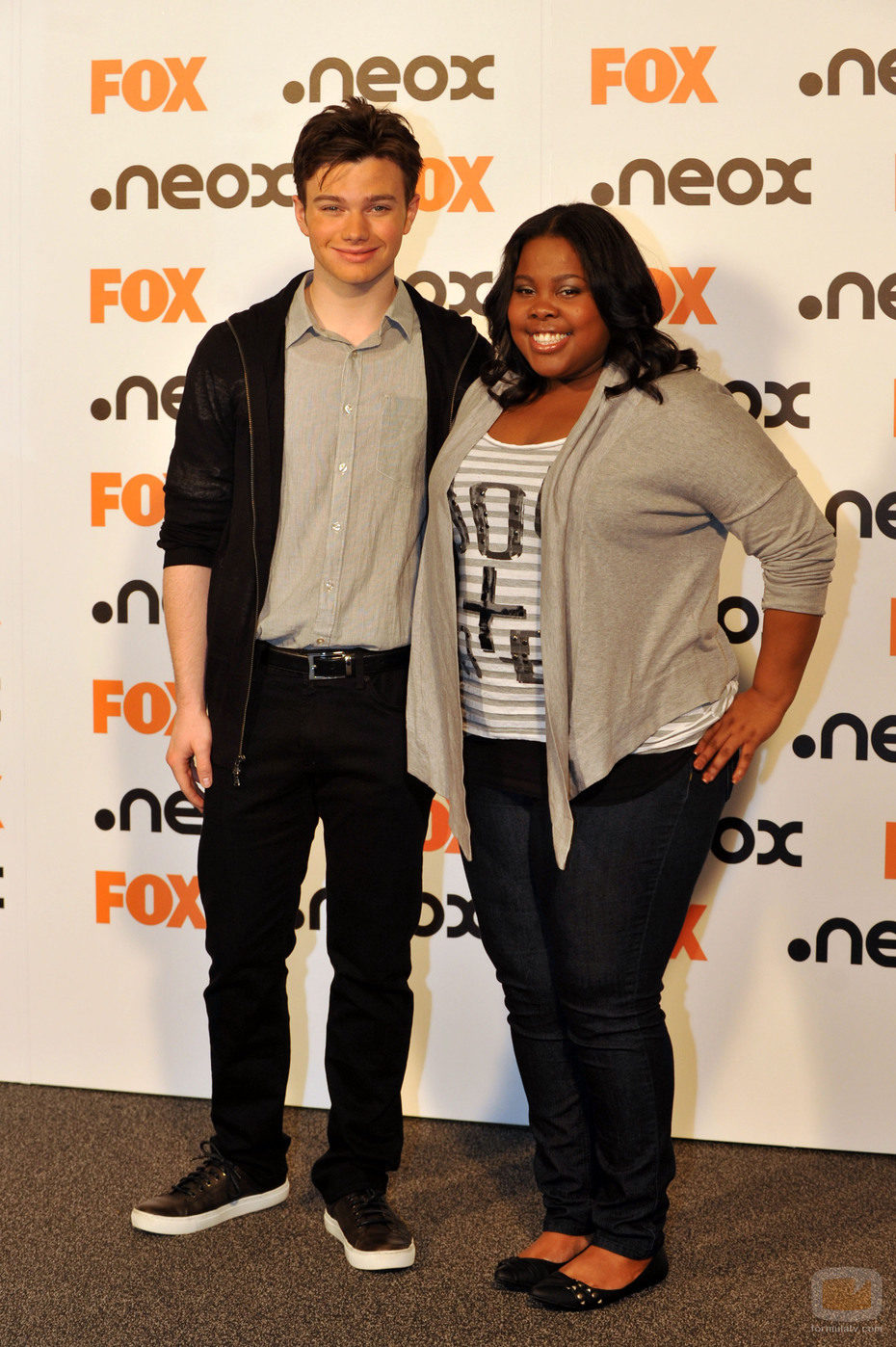 Chris Colfer y Amber Riley en España