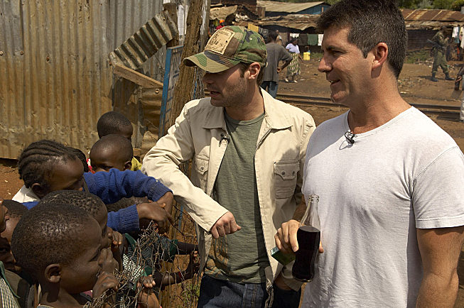 Ryan Seacrest y Simon Cowell