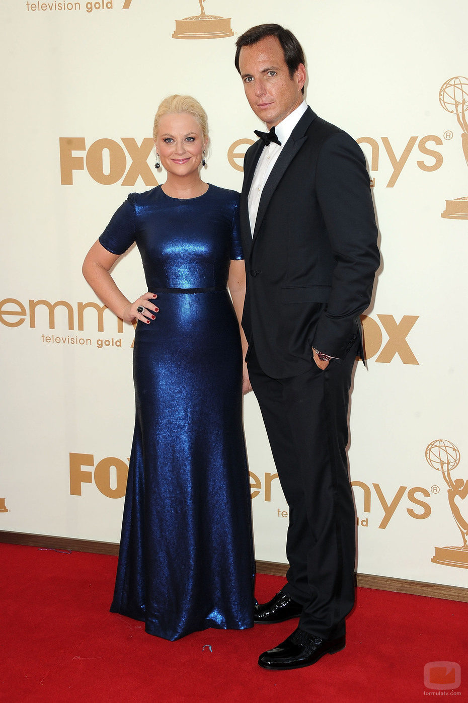 Amy Poehler y su marido Will Arnett en la Alfombra Roja de los Emmy 2011