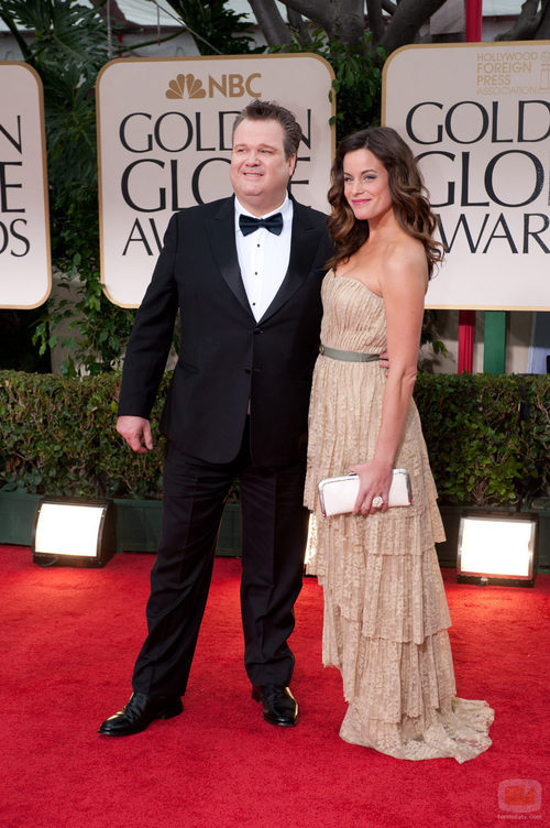 Eric Stonestreet y Katherine Tokarz en los Globos de Oro 2012