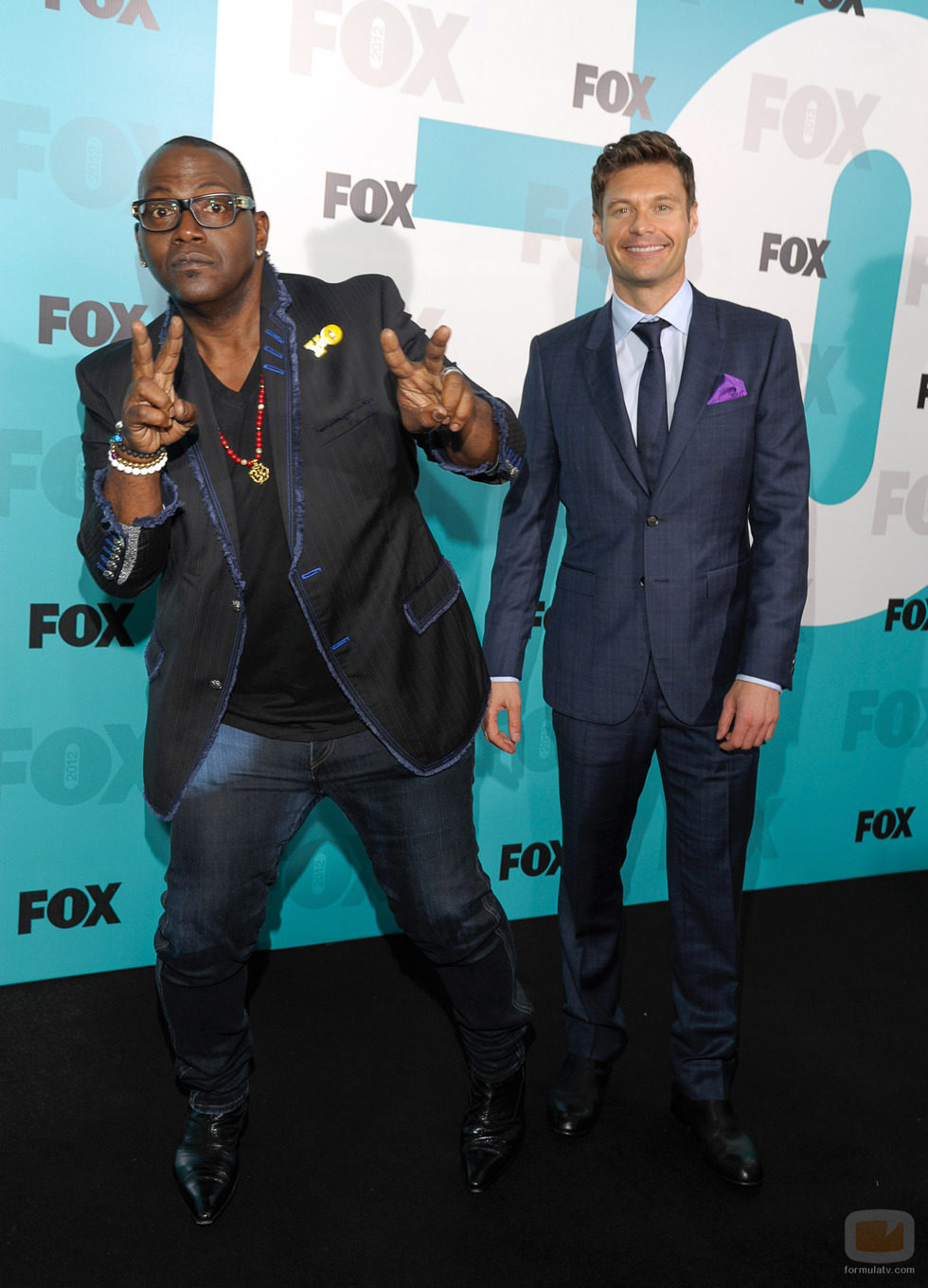 Randy Jackson y Ryan Seacrest en los Upfronts de Fox