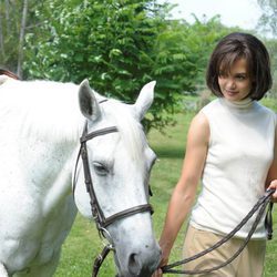 Jackie Kennedy pasea con su caballo 