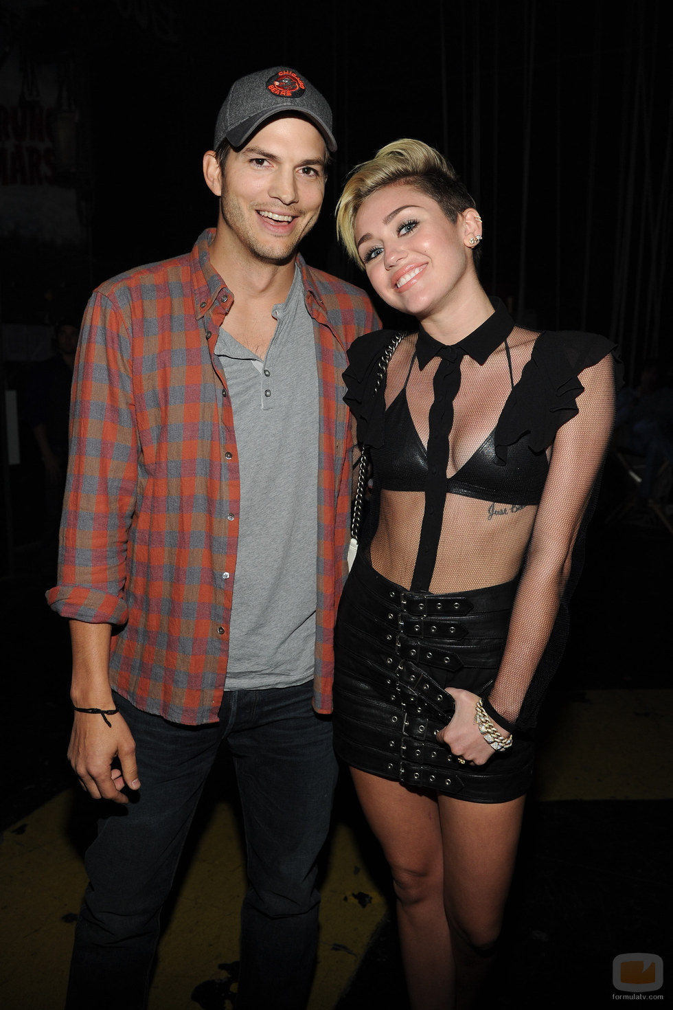 Ashton Kutcher y Miley Cyrus en los Teen Choice Awards 2013