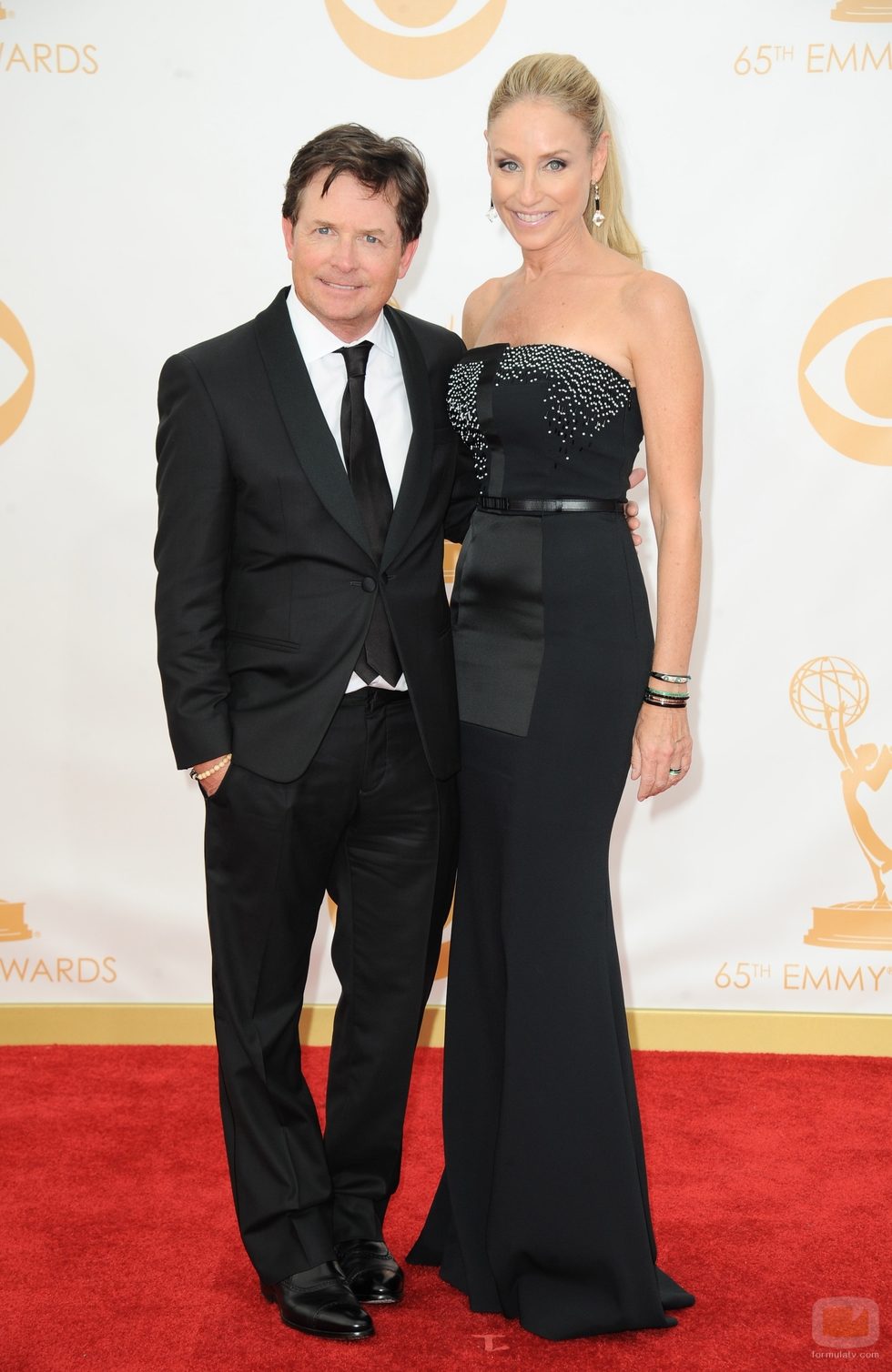 Michael J. Fox, y Tracy Pollan en la alfombra roja de los Emmy 2013