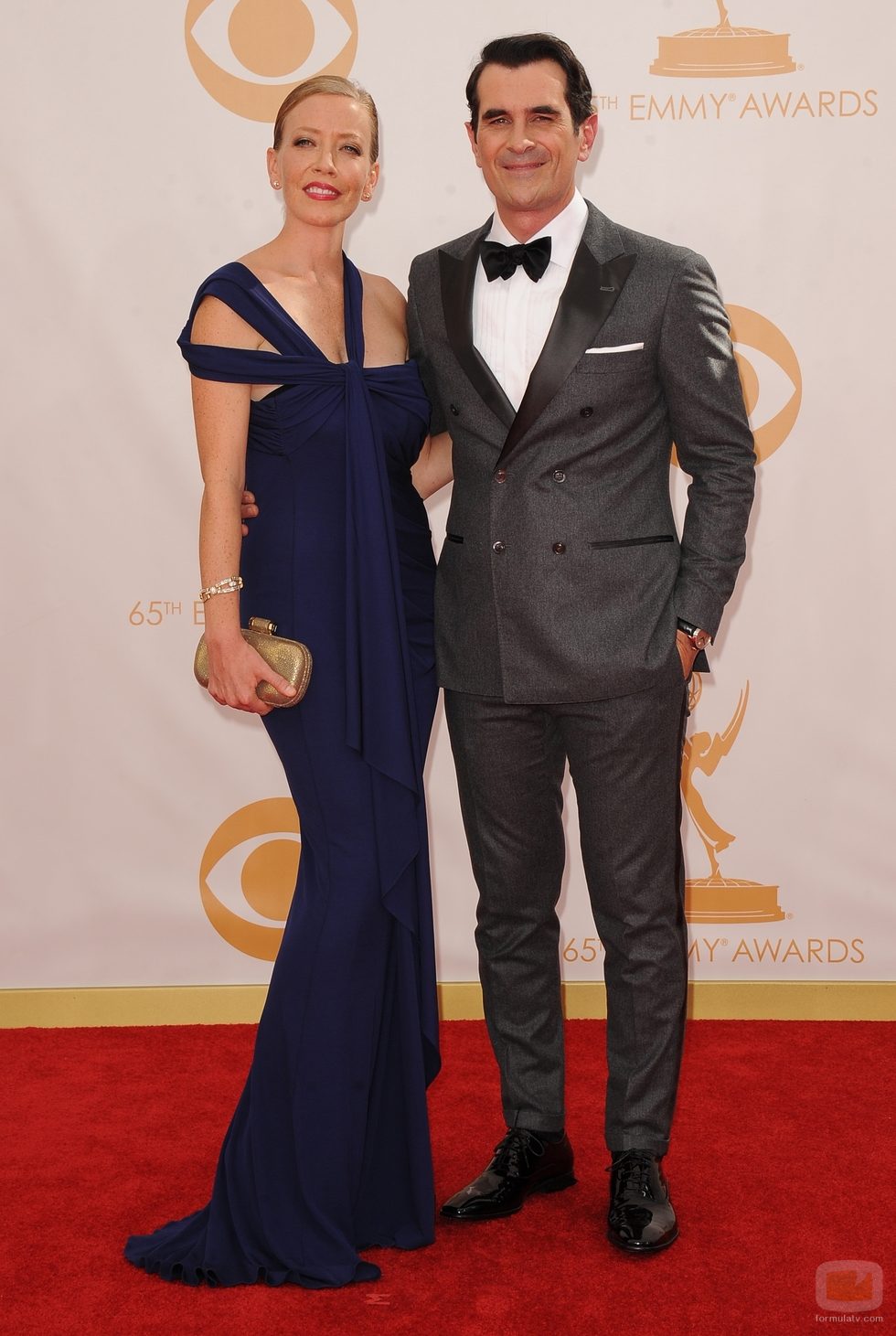 Holly Burrell y Ty Burrell en la alfombra roja de los Emmy 2013
