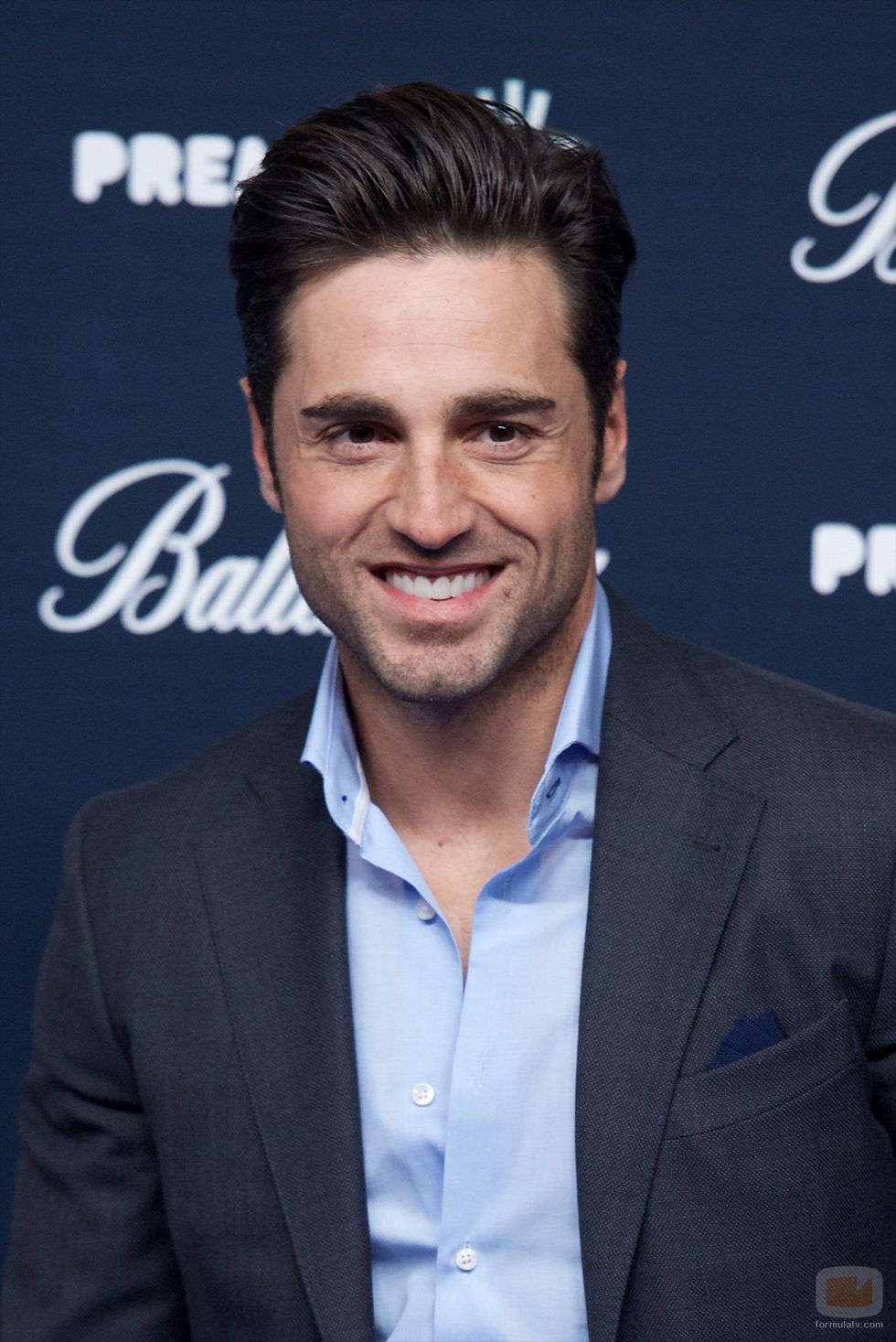 David Bustamante posando en el photocall de los Premios 40 Principales 2014