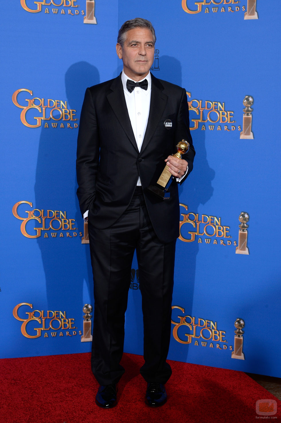 George Clooney con el premio honorífico Cecil B. DeMille en los Globos de Oro 2015