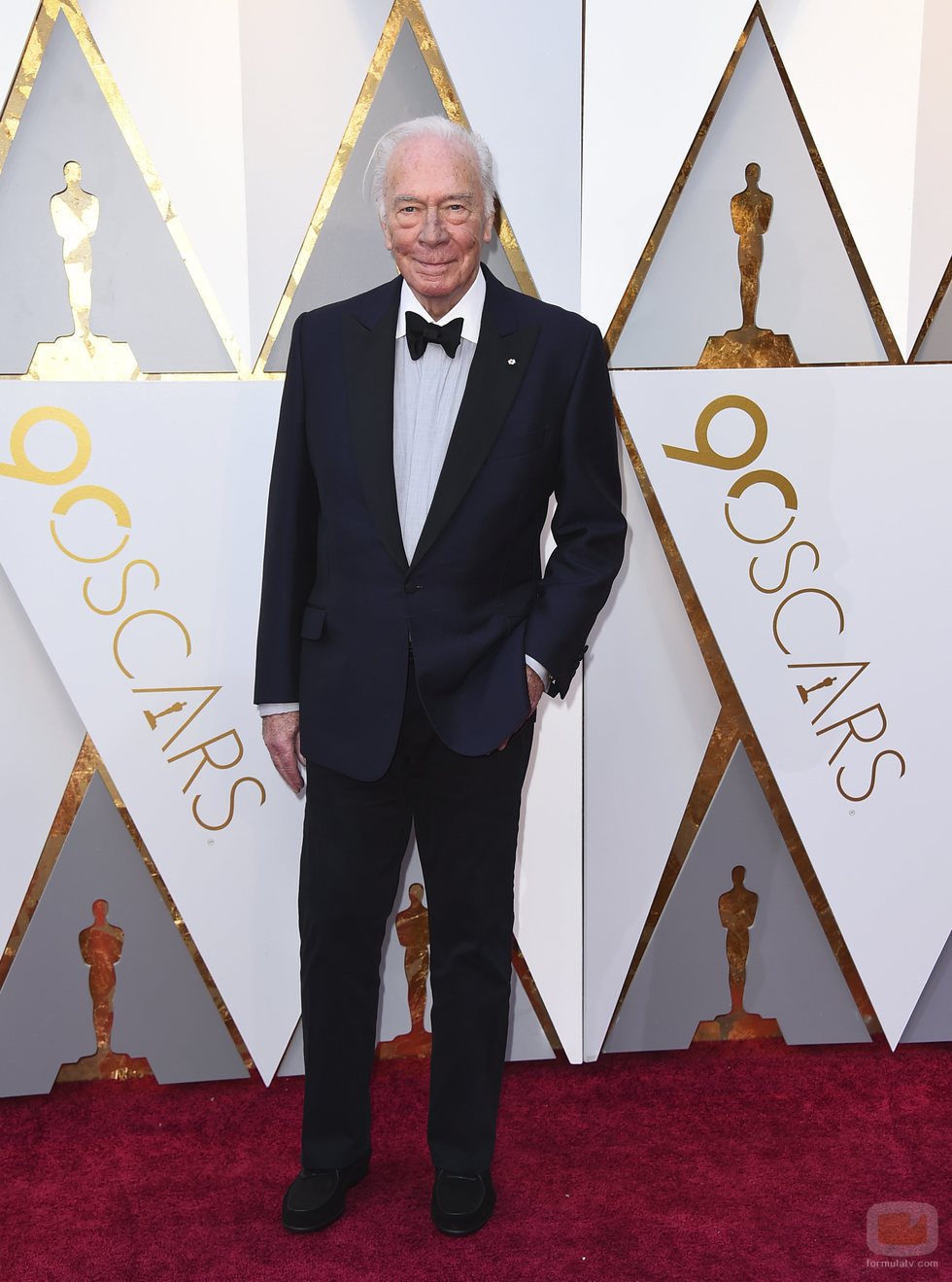 Christopher Plummer posa en la alfombra roja de los Oscar 2018