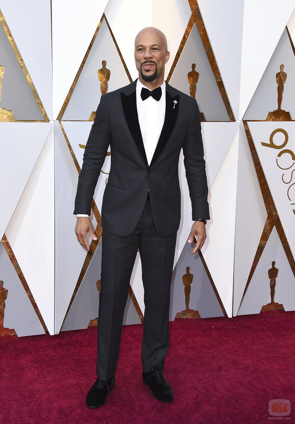 Common posa en la alfombra roja de los Oscar 2018