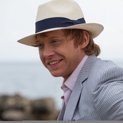 Rupert Grint sonriente en este fotograma de 'Snatch'