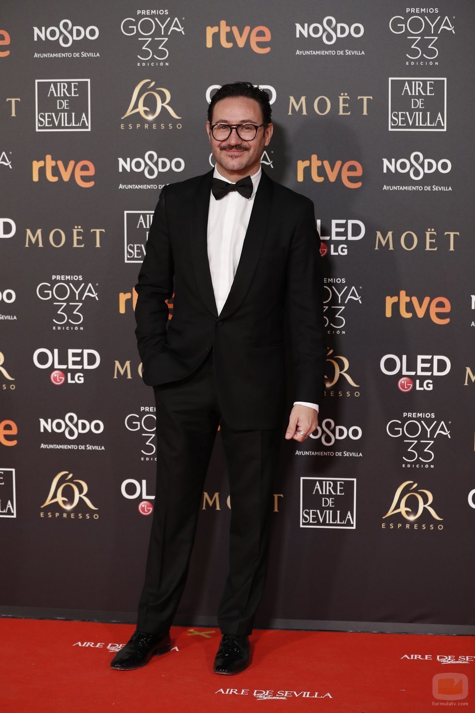 Carlos Santos posa en la alfombra roja de los Premios Goya 2019