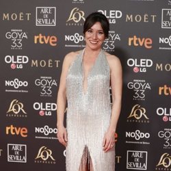 Lola Dueñas posando en la alfombra roja de los Premios Goya 2019