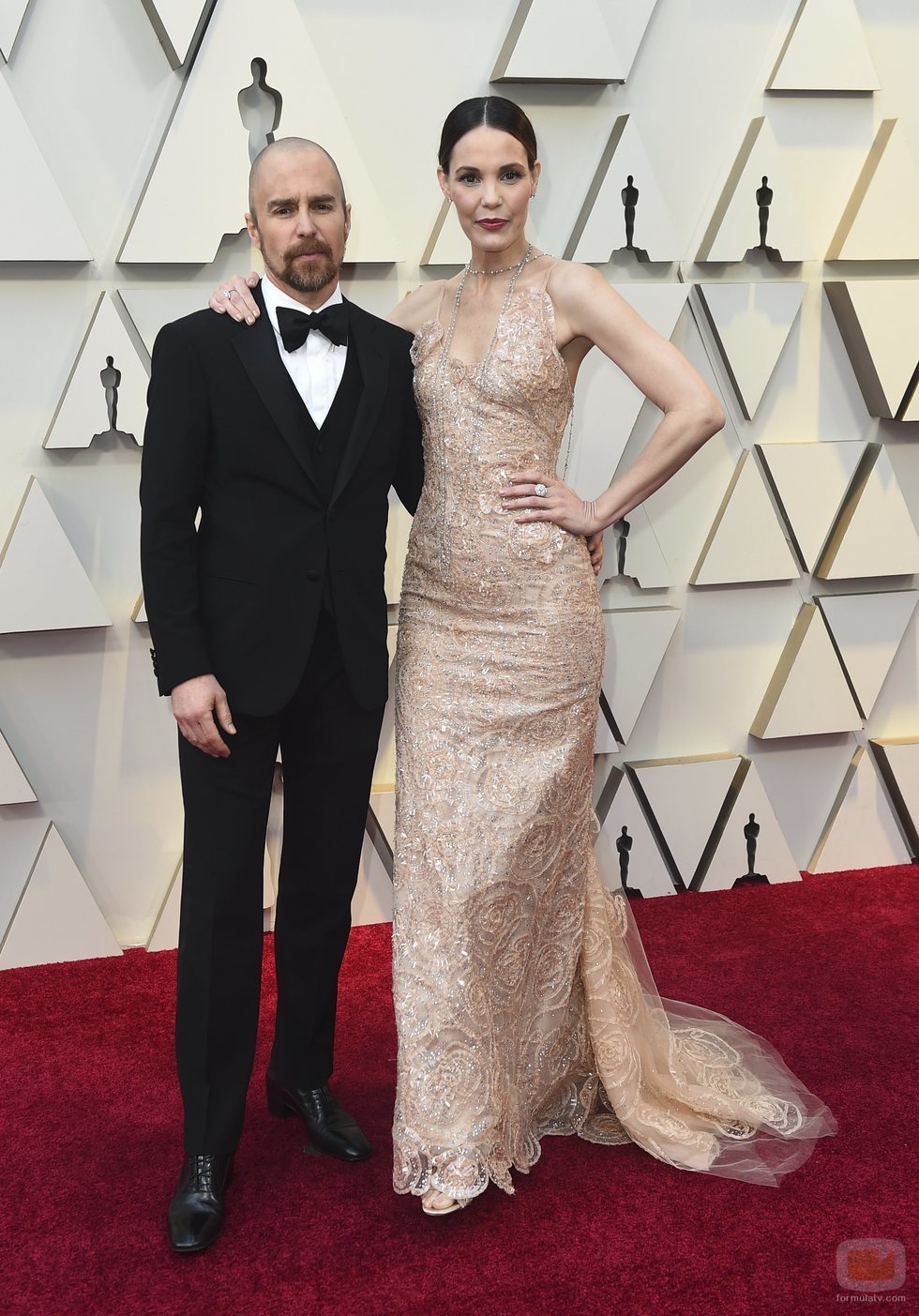 Sam Rockwell y Leslie Bibb en la alfombra roja de los Oscar 2019