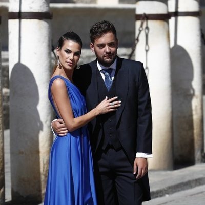 Carla Barber junto a un amigo de Pilar Rubio en la boda de esta con Sergio Ramos