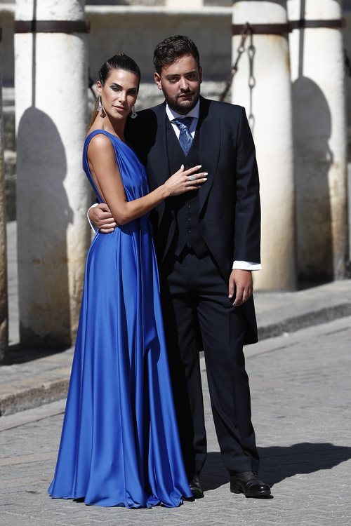 Carla Barber junto a un amigo de Pilar Rubio en la boda de esta con Sergio Ramos