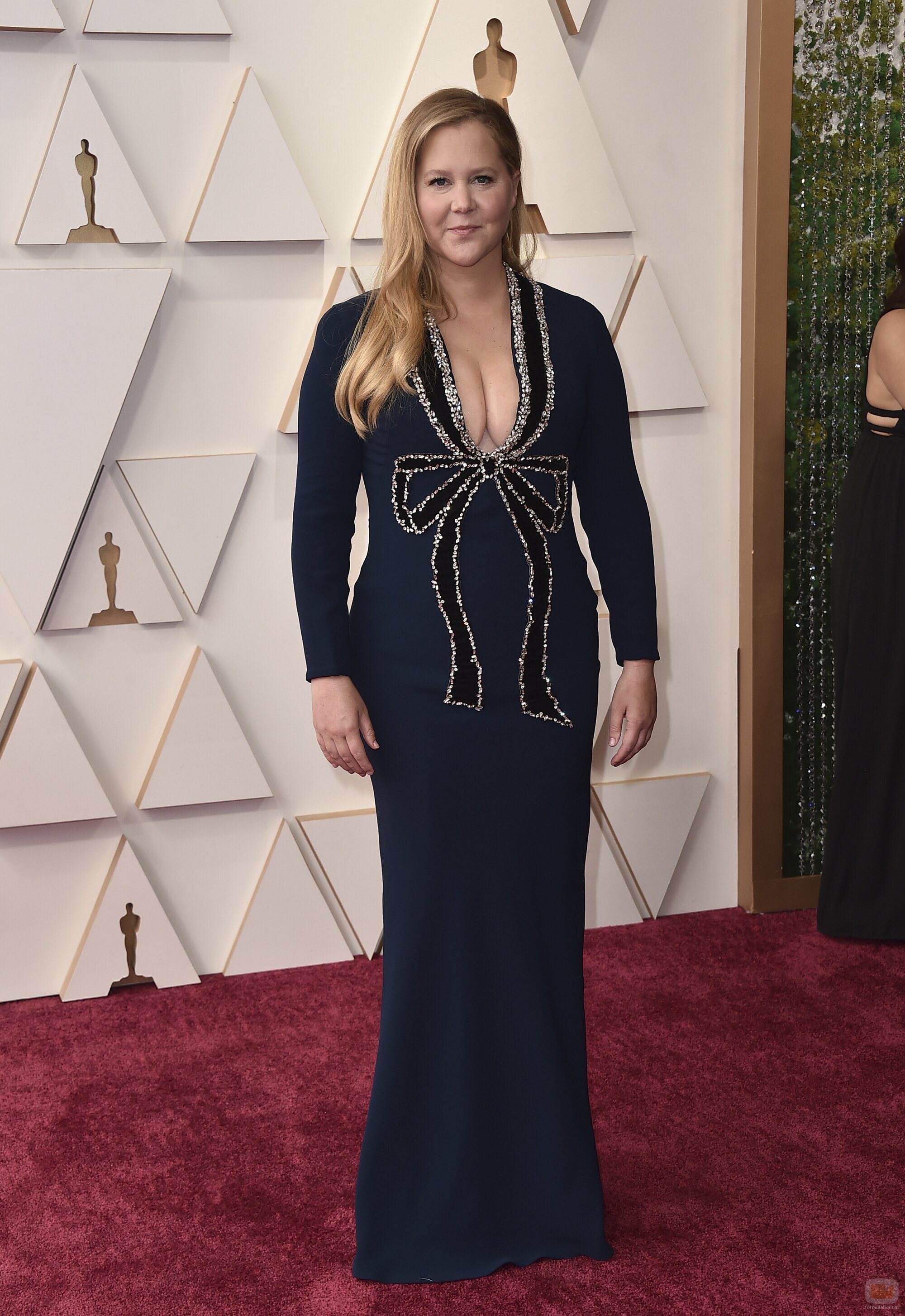 Amy Schumer posa en la alfombra roja de los Oscar 2022