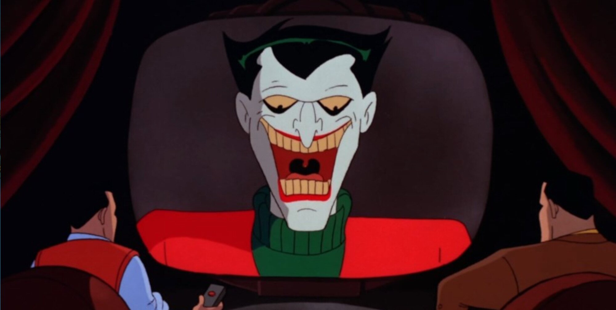El Joker aparece en las televisiones de la mansión Wayne en navidad en 'Batman'