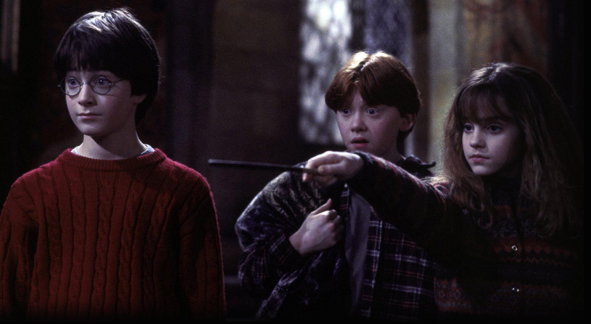 Daniel Radcliffe, Emma Watson y Rupert Grint como Harry, Hermione y Ron