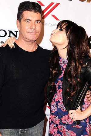 Simon Cowell y Demi Lovato
