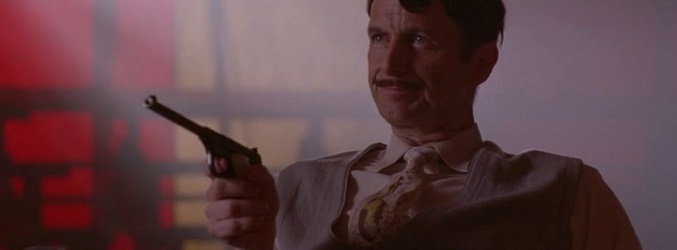 Stanley apunta a Dell con una pistola