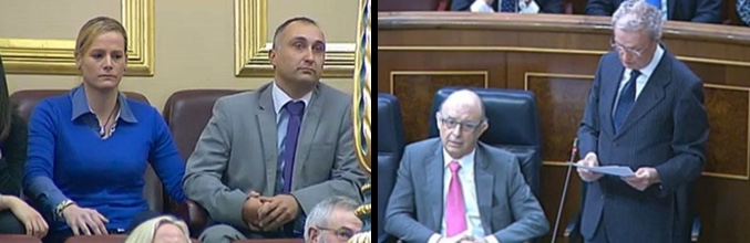 Zaida y su marido escuchando la explicación del ministro Morenés