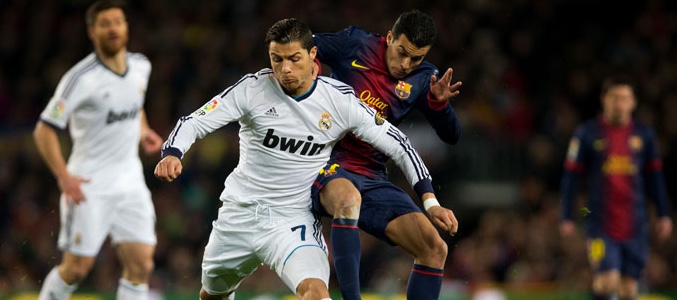 Instantánea de un partido entre el Real Madrid y el F.C. Bacerlona