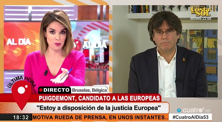 Carme Chaparro y Carles Puigdemont durante la entrevista en 'Cuatro al día'