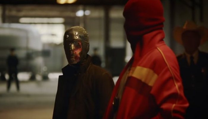 Looking Glass y otro personaje enmascarado en 'Watchmen'